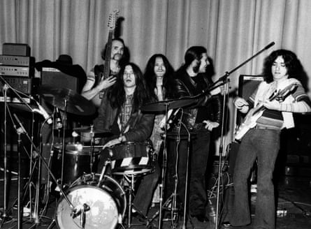 Damo Suzuki, centre, with fellow Can members, from left, Holger Czukay, Jaki Liebezeit, Irmin Schmidt and Michael Karoli, around 1971.