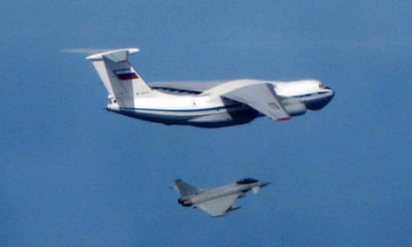 A Royal Air Force Typhoon fighter jet (bottom) near a Russian IL76 Candid aircraft off the Baltic coast, 12 May 2016.