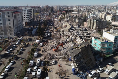 An aerial view of collapsed buildings as search and rescue efforts continue in Van, Turkey.