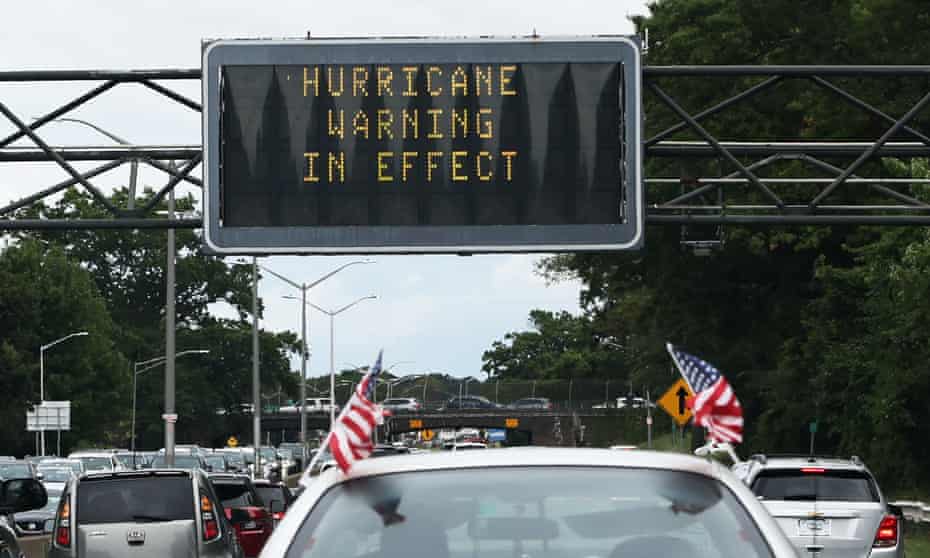 A road sign flashes a hurricane warning on the eve of landfall by Hurricane Henri on 21 August 2021 in Valley Stream, New York.