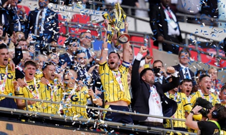 Elliott Moore lifts the trophy as Oxford seal their spot in next Seasons Championship.