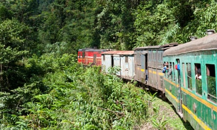 Vintage train traveling through jungle, Fianarantsoa-Cote Est