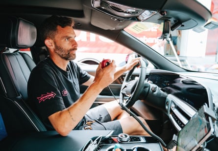 Tom Southam at the wheel of the EF Education EasyPost team car