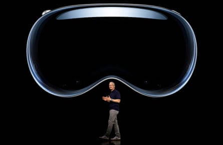 Tim Cook of Apple unveiling the firm’s augmented reality headset. Revenue at the company is forecast to fall.
