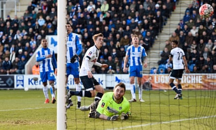 Carroll scores for Mauricio Pochettino’s Spurs in an FA Cup fourth round win at Colchester in January 2016.
