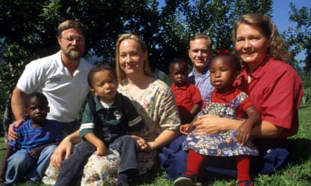 Rachel Dolezal in 1996 with her parents, Larry and Ruthanne, her brother Joshua, and four children the family had recently adopted.