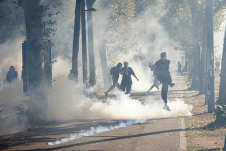 Students kick back teargas canisters in Strasbourg