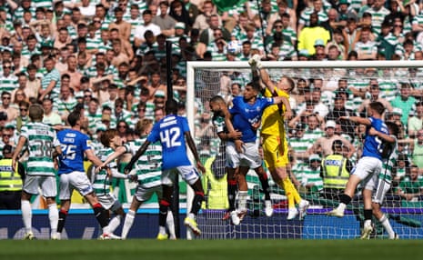 Cameron Carter-Vickers of Celtic tangles with Scott Wright of Rangers