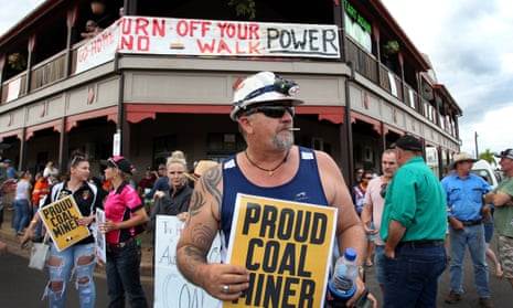 Locals and pro-Adani supporters protest against anti-Adani environment activists as they arrive by convoy on April 27, 2019 in Clermont.