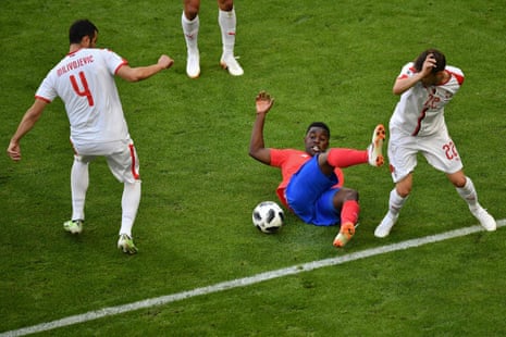 Costa Rica’s forward Joel Campbell in the thick of things.