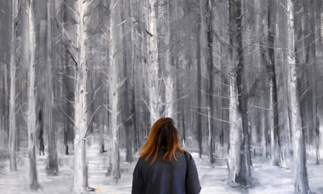 A visitor looks at a painting entitled Paysage International-forêt by Yan Pei-Ming in Colmar, France.