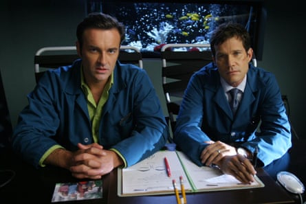 Julian McMahon as Dr Christian Troy and Dylan Walsh as Dr Sean McNamara in Nip/Tuck.