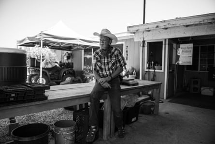 Randy Bekendam in cowboy hat outside his farm.