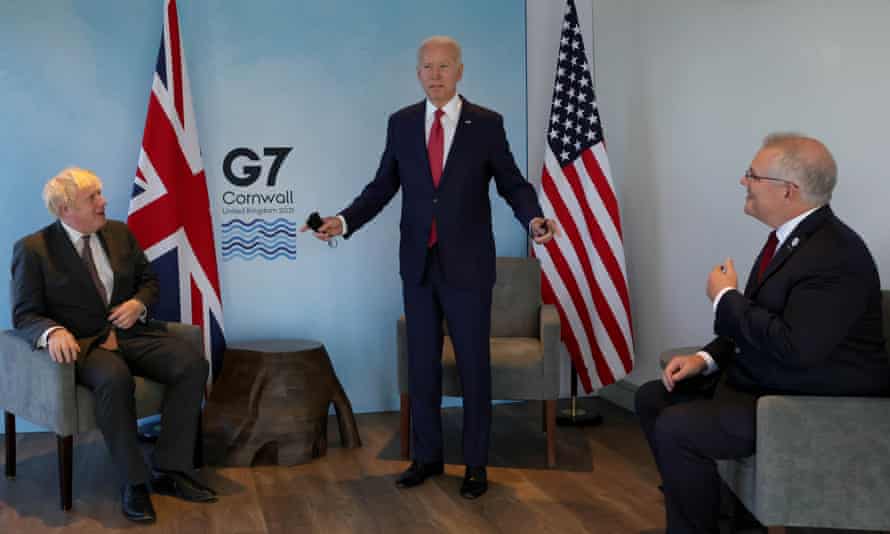 (L-R) British premier  curate  Boris Johnson, US president   Joe Biden and Australian PM Scott Morrison conscionable   during the G7 acme  successful  Cornwall successful  June.