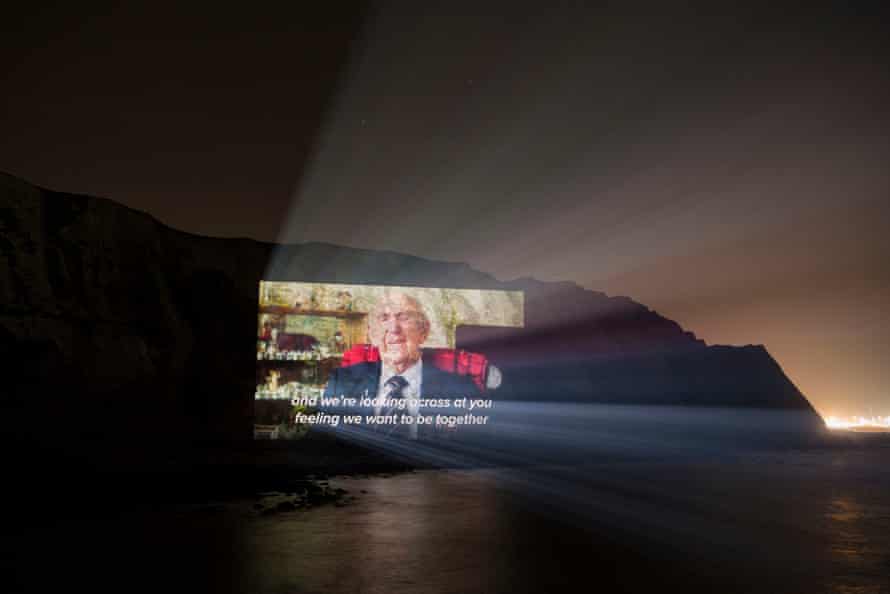A projection of second world war veteran Sid talking about Brexit on the White Cliffs of Dover.