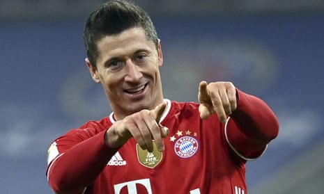 Bayern Munich’s Robert Lewandowski celebrates scoring his side’s fourth goal in their comeback win against Borussia Dortmund.