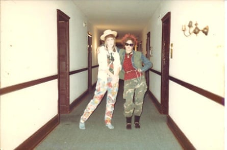 Image of two women standing in a hallway