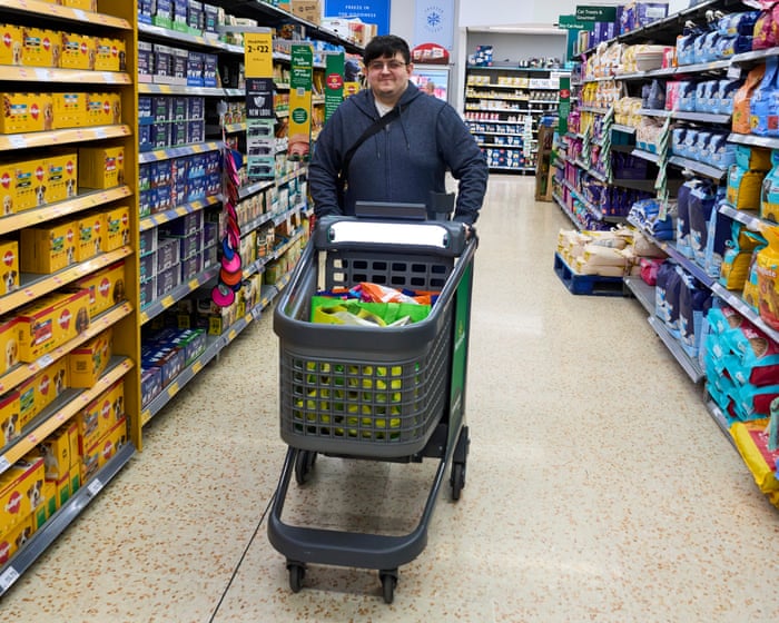 ‘They make life much easier’: AI-powered shopping trolleys go on trial in Lancashire