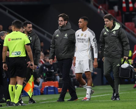 Real Madrid’s Trent Alexander-Arnold walks off the pitch after sustaining an injury