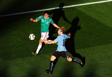 Diego Forlán of Uruguay shapes to give the Jabulani a wallop in 2010.
