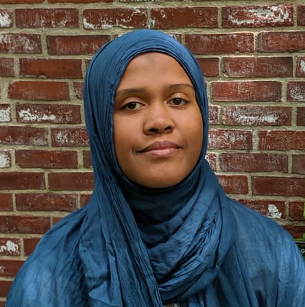 a women looking at a camera