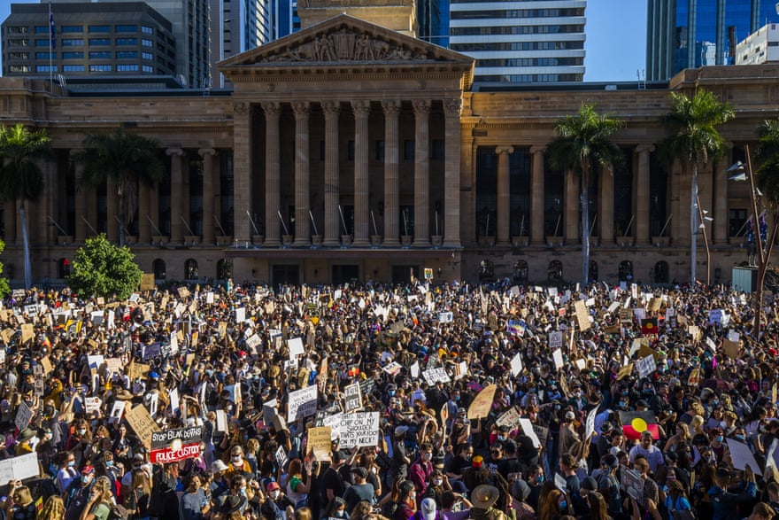 Protesters participate in a Black Lives Matter rally in Brisbane, Saturday, June 6, 2020.