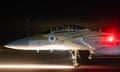 Israeli fighter jet on a runway in the dark