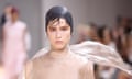 A model walks the runway as slime oozes from the ceiling