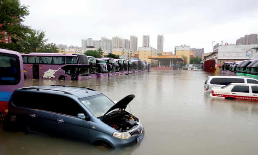 Vehicles inundated by flood water in Zhengzhou.