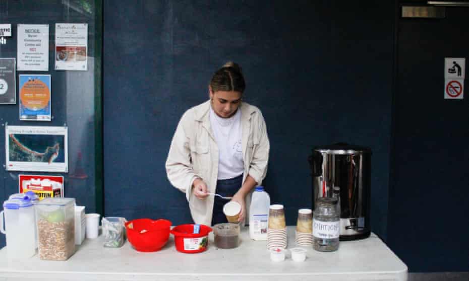 Ianna Murray, 29, a community case worker in Byron prepares coffee for the community centre’s free homeless breakfast.