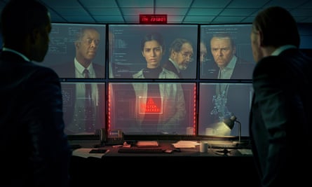 Andrew (Adrian Lester), Saara, John and Danny (Simon Pegg), reflected on a bank of computer screens.