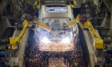 Robots weld vehicle panels at the Nissan plant in Sunderland.