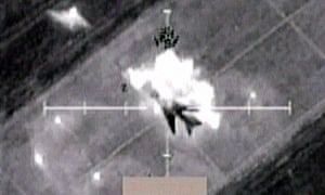 A video grab shows a still image of cockpit video of an undated attack by US-led forces over Iraq, which was shown at the daily military briefing in Qatar, 31 March 2003