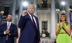 Donald Trump Jr, Donald Trump and Melania Trump stand on the South Lawn of the White House during the final night of the Republican national convention on 27 August.