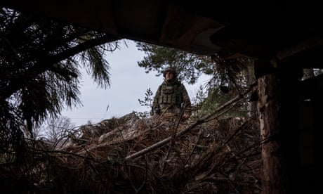 Soldiers hold their positions in a network of trenches  1,500m from the Russian border in the Sumy region, Ukraine.