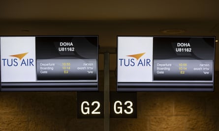 Flight screens at Tel Aviv airport. Qatar has given special permission for direct flights.