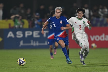 Cavan Sullivan (6) United States and Ilyas El Arbaoui(3) of Morocco battle for the ball duringthe FIFA Under-17 World Cup match between USA and Morocco at Aspire Academy on November 14, 2025 in Doha, Qatar.