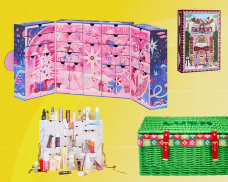 Four colourful beauty advent calendars with numbered drawers and a green woven basket, on yellow background