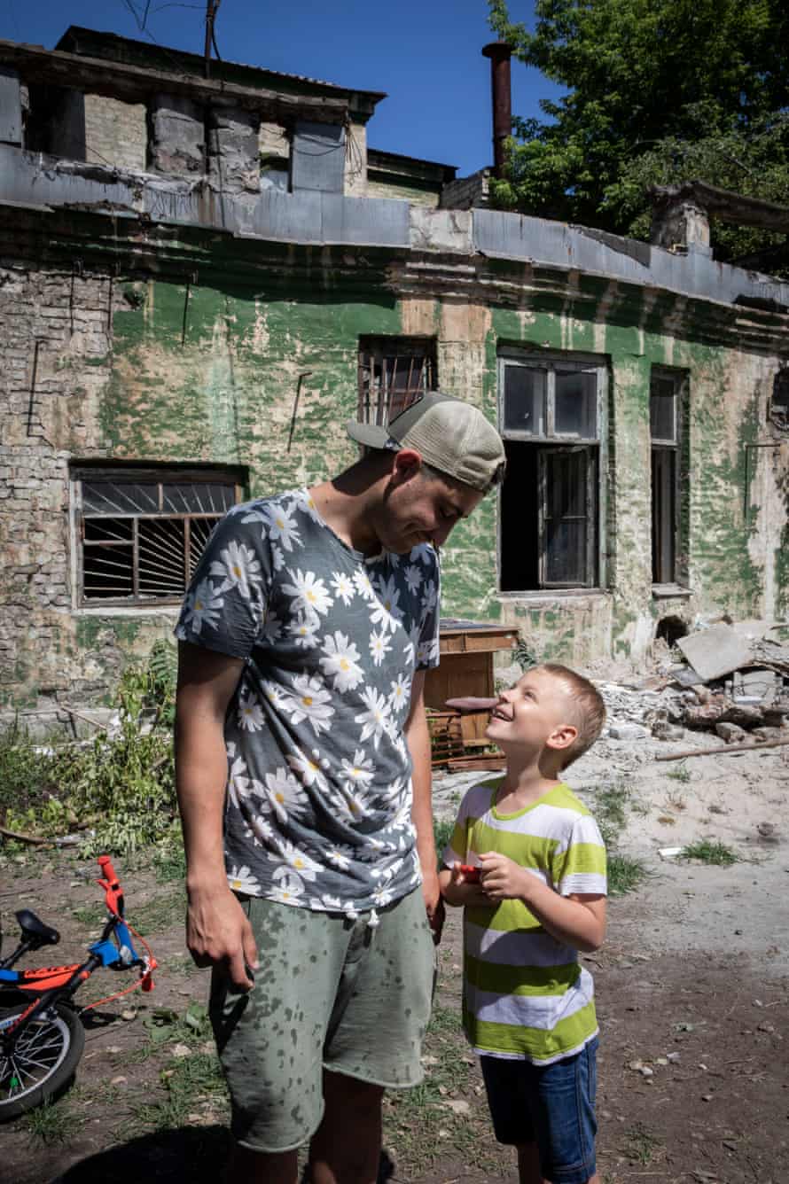 Yefym Konstantinovskyi (left), a volunteer at the shelter Good on Love.