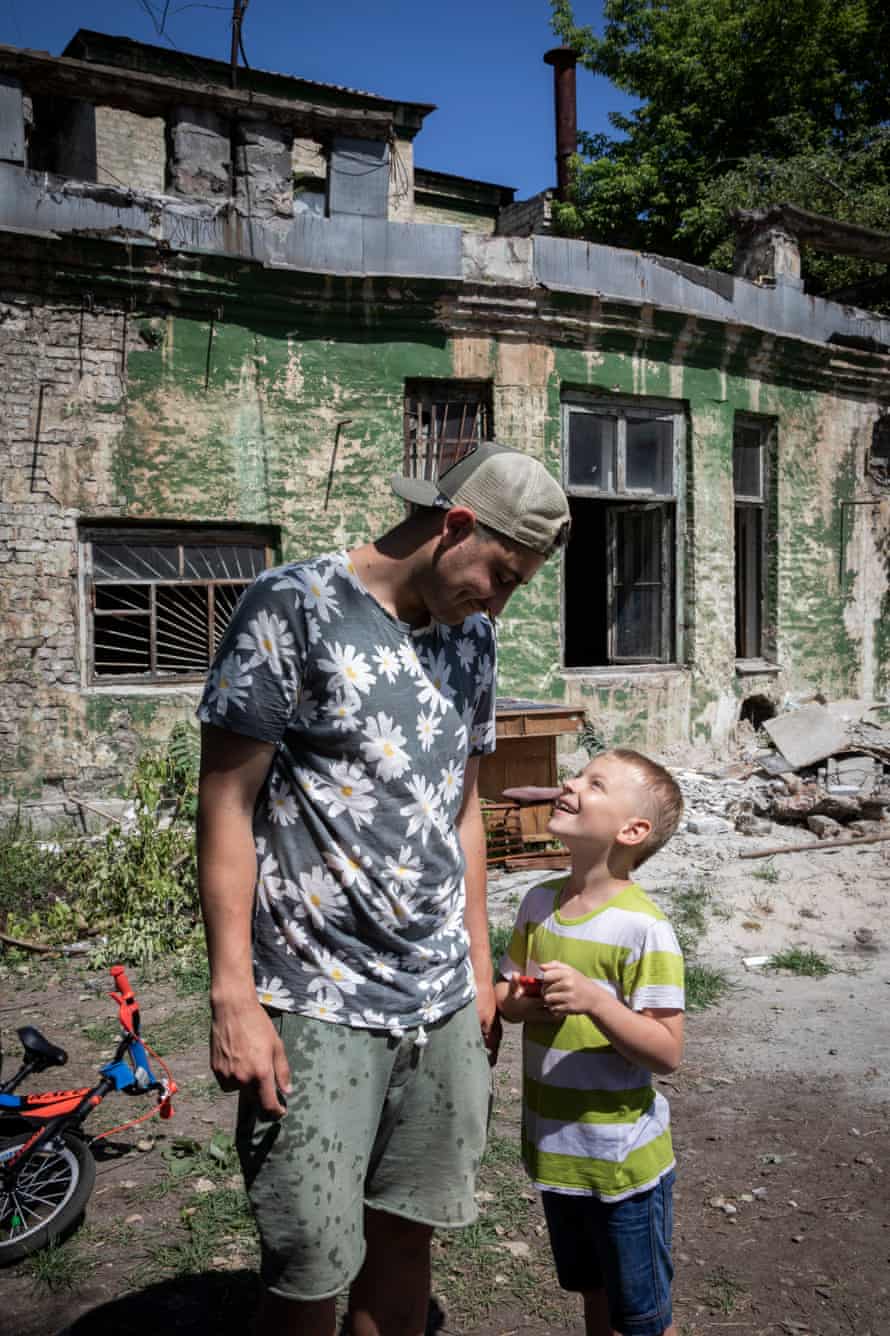 Yefym Konstantinovskyi (left), a volunteer at the Good on Love shelter.