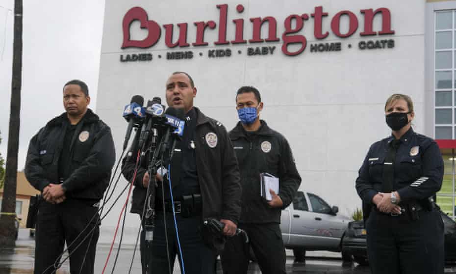 Los Angeles police at the scene where two people were struck by gunfire in a shooting at a Burlington store in North Hollywood, California.