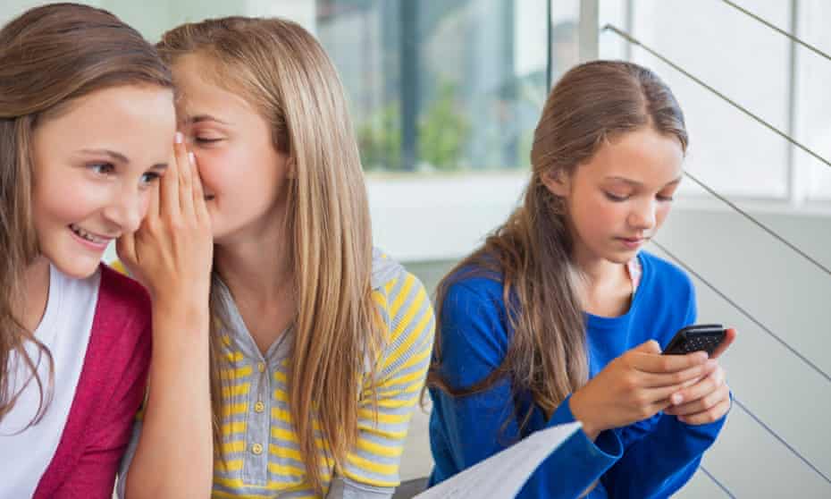 Children talk and use mobile phones