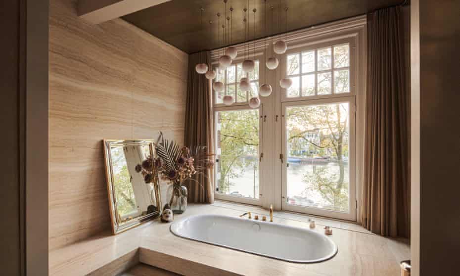 The bathroom, with views across the Amstel river