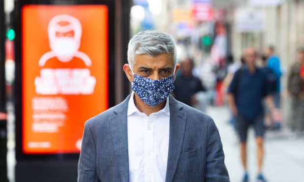 Sadiq Khan wears a face mask on a visit to Oxford Street in central London.
