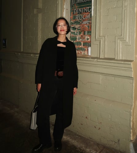 Maggie Zhou wears a velvet bodysuit and Levi’s under her trusty black coat for a more formal look.