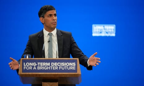 Rishi Sunak at podium that says: 'Long-term decisions for the brighter future'