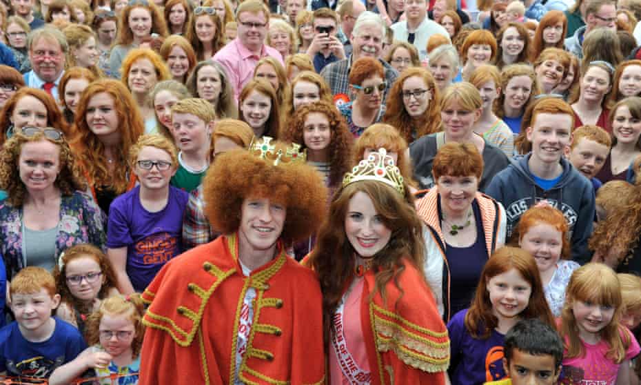 A group of people with red hair at an annual convention in Ireland.
