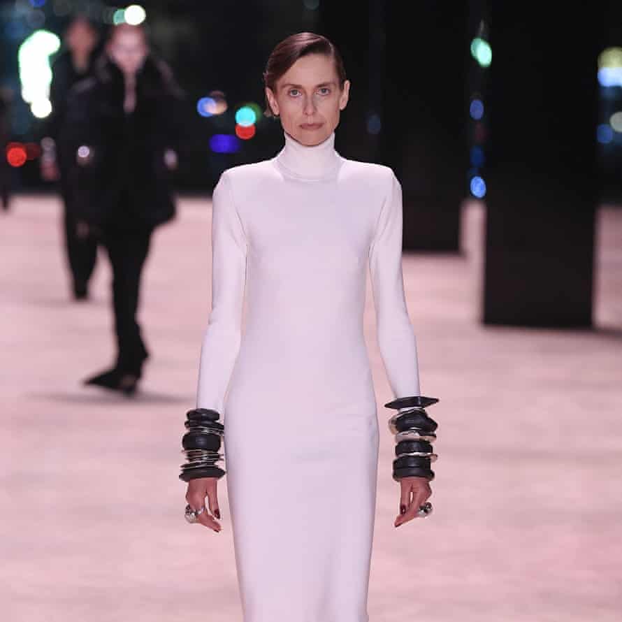 A vision in white from the Saint Laurent show Runway, Autumn Winter 2022, Paris fashion week.