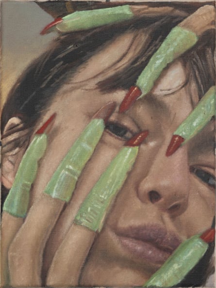 A bit of silliness … Self portrait 63, 2024, by Issy Wood. A full face image, with Wood holding her head in both hands, wearing green toy fingers with red nails
