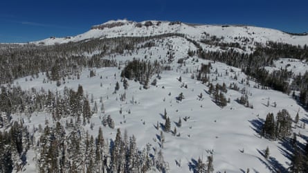Aerial view of snowy mountainside.